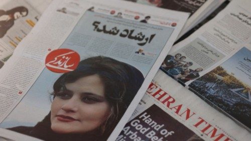 FILE PHOTO: A newspaper with a cover picture of Mahsa Amini, a woman who died after being arrested ...