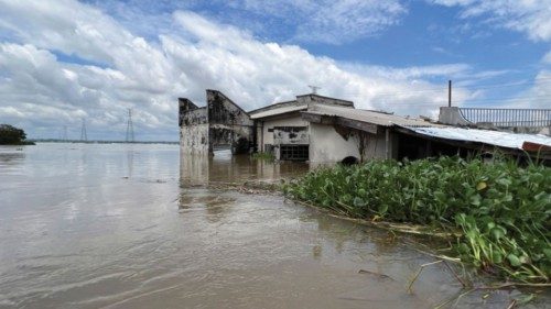 An office of a 50-hectare rice farm is submerged in floodwater from Benue river in Makurdi, Nigeria, ...