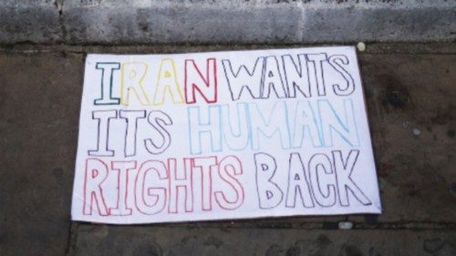 A placard is pictured during a protest against the Iranian regime, following the death of Mahsa ...