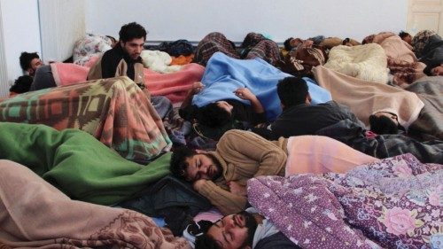 Rescued migrants find shelter at an old school building, following a shipwreck, on the island of ...