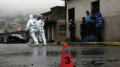 Members of the National Police and forensic experts work at the crime scene where journalist Edwin ...
