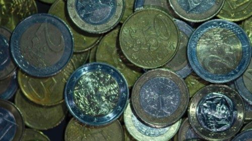 (FILES) This file photo taken on January 27, 2020 shows Euro coins in Dortmund, western Germany. - ...