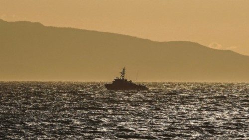 A Greek Coast Guard vessel sails, after a boat carrying migrants sank, off the island of Lesbos, ...