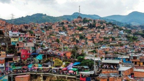 General view of the Comuna 13 neighbourhood in Medellin, Colombia, on February 13, 2022. - One word ...