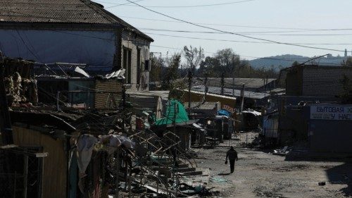 A man walks through a shopping street destroyed by Russian strikes, amid Russia's attack on Ukraine, ... A man walks through a shopping street destroyed by Russian strikes, amid Russia's attack on Ukraine, ...