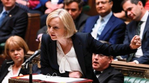 A handout photograph released by the UK Parliament shows Britain's Prime Minister Liz Truss speaking ...