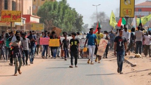 Protesters march during an anti-government protest demanding return to civilian rule in Sudan's ...