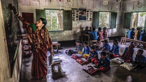 Children sit in class in the Caritas-supported Bulakipur Lighthouse school in Dinajpur District, ...
