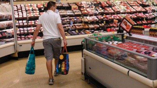 (FILES) In this file photo taken on May 26, 2022 a person shops in a supermarket in Washington, DC, ...