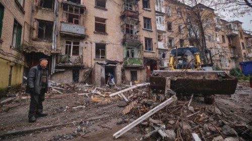 epa10267255 Communal workers clean debris of a residential building damaged in an overnight shelling ... epa10267255 Communal workers clean debris of a residential building damaged in an overnight shelling ...