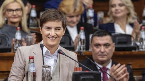 FILE PHOTO: Serbia's Prime Minister-designate Ana Brnabic smiles before presenting government ...