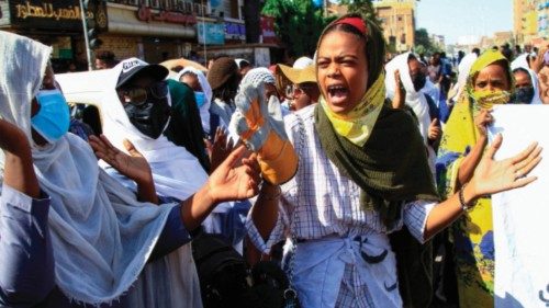 Anti-coup demonstrators rally in Khartoum Bahri north of the Sudanese capital on October 27, 2022. - ...