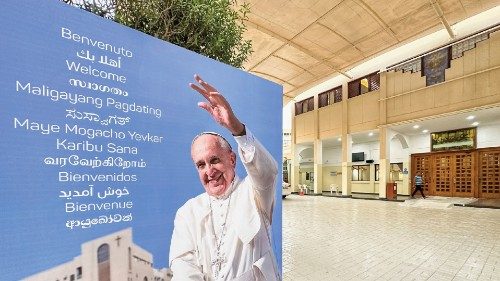 Welcome banners are displayed at Sacred Heart Catholic Church, one of the places Pope Francis will ...