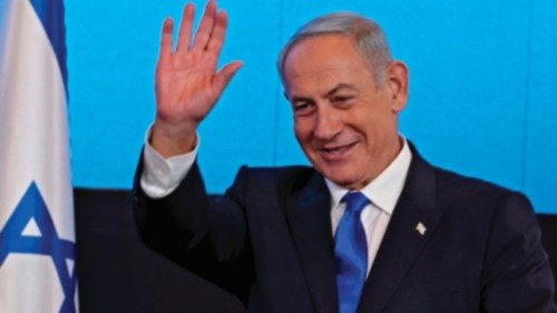 TOPSHOT - Israel's ex-premier and leader of the Likud party Benjamin Netanyahu addresses supporters ...