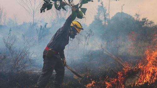 (FILES) This file photo taken on September 21, 2022 shows a firefighter who combats a fire on the ...