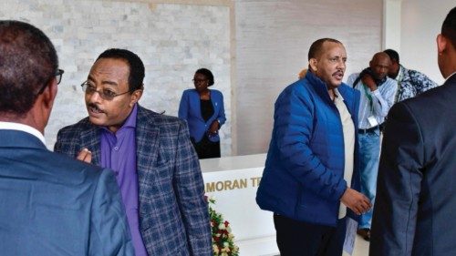 Getachew Reda (2nd R), advisor to the President of the Tigray Region, Debretsion Gebremichael and ...