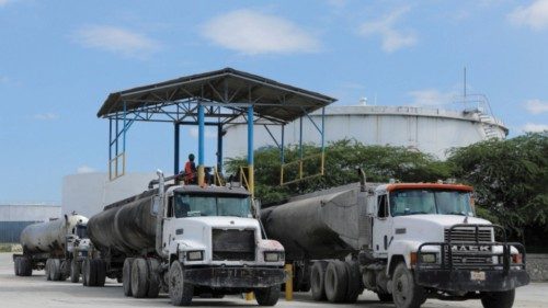 Tanker trucks are being loaded with fuel at the Varreux terminal after distribution was halted for ...