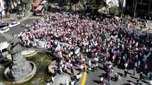 epa10304575 Hundreds of people march in defense of the National Electoral Institute (INE) and ...