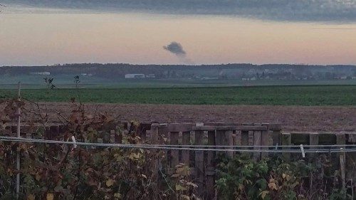 Smoke rises in the distance, amid reports of two explosions, seen from Nowosiolki, Poland, near the ...