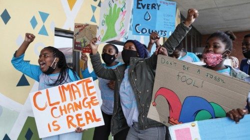 FILE PHOTO: Young activists gesture as they take part in a demonstration during a global day of ... FILE PHOTO: Young activists gesture as they take part in a demonstration during a global day of ...