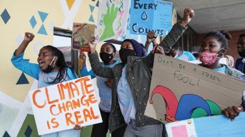 FILE PHOTO: Young activists gesture as they take part in a demonstration during a global day of ...