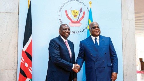 Kenyan President William Ruto (L) greets the President of Democratic Republic of Congo Felix ...