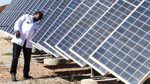 Dr Stanford Chidziva, acting director of Green Hydrogen, looks at the solar panels at the site where ...