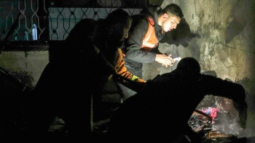 Palestinian firefighters extinguish a fire which broke out in one of the apartments in the Jabalia ...