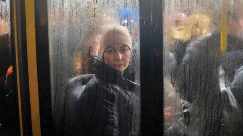 TOPSHOT - A passenger looks on while seating in a bus during a foggy night on November 24, 2022, in ...