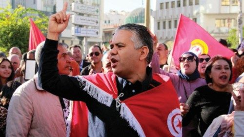 People shout slogans during a protest in Tunisia's second city Sfax on November 17, 2022 over a ...