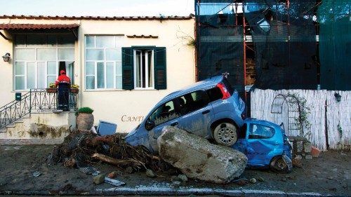 TOPSHOT - A rescuer checks a damaged house in Casamicciola on November 27, 2022, following heavy ...