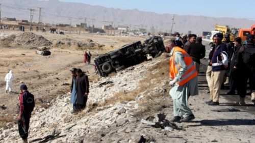 epa10338174 Pakistani security officials inspect the scene of a bomb blast in Quetta, the provincial ...