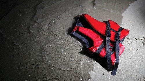 An abandoned life jacket is seen on the beach after a group of migrants left the coast of northern ...