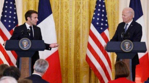 TOPSHOT - US President Joe Biden and French President Emmanuel Macron hold a joint press conference ...