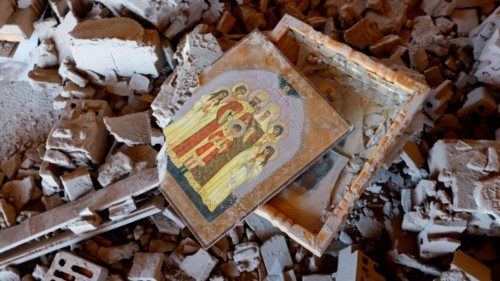 Icons are seen amidst debris of a building on the premises of a local church, which was damaged in ...