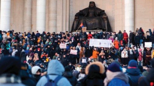 People gather to protest alleged corruption in coal industry and soaring inflation at Sukhbaatar ...