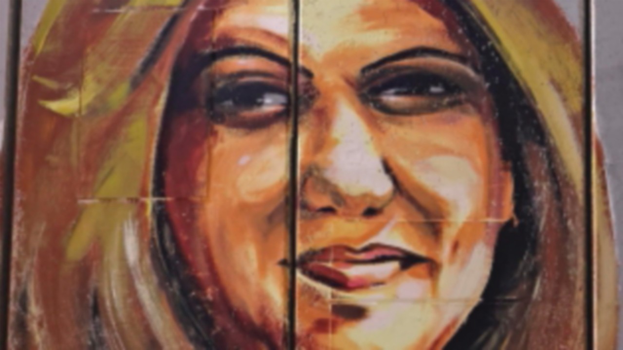An art mural of slain US-Palestinian correspondent Shireen Abu Akleh is pictured at a section of ...