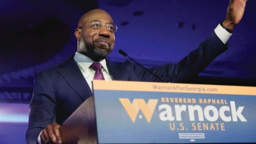U.S. Senator Raphael Warnock (D-GA) speaks during an election night party after a projected win in ...