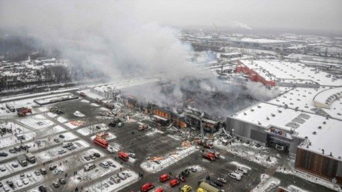 Russia firefighters battle a massive blaze the size of a football pitch which broke out overnight at ...