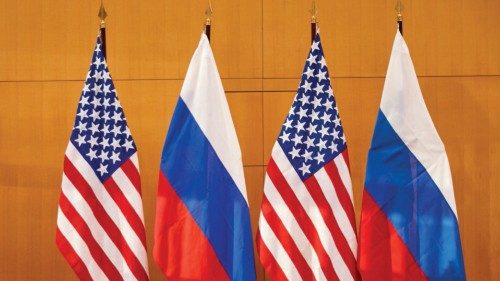 US and Russian flags are displayed at the US permanent Mission, in Geneva, on January 10, 2022 for ...