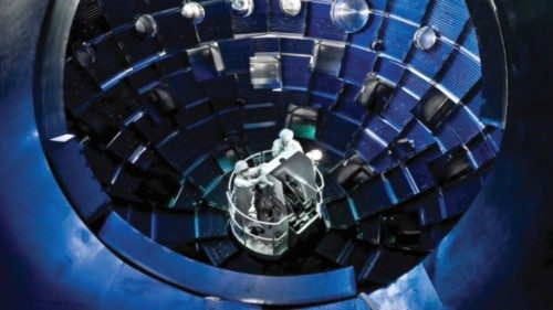 FILE PHOTO: Technicians use a service system lift to access the target chamber interior for ... FILE PHOTO: Technicians use a service system lift to access the target chamber interior for ...