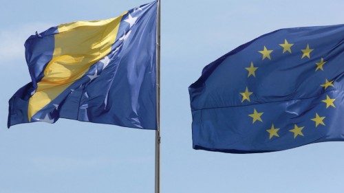 (FILES) In this file photo taken on August 13, 2018, the national flag of Bosnia and Herzegovina (L) ...