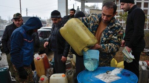 A vendor sells gasoline in the town of Lachin on November 29, 2020, after six weeks of fighting ...