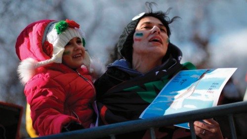 People protest against executions and detentions in Iran, in front of the Iranian Permanent Mission ...