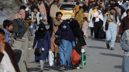 FILE PHOTO: People walk in a street in Kabul, Afghanistan, November 9, 2022. REUTERS/Ali Khara/File ...