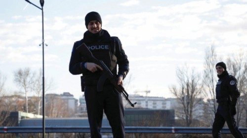 Kosovo police officers patrol in the northern part of the ethnically-divided town of Mitrovica, ...