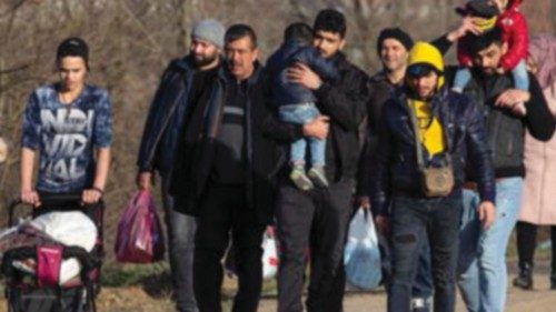 epa08267241 A group of migrants walk towards Turkish-Greek border in Edirne, Turkey, 03 March 2020. ...