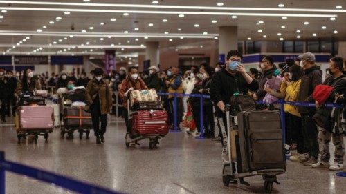 epa10395505 People who landed with international flight walk towards the exit of the Pudong ...