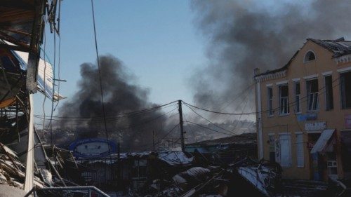 FILE PHOTO: Plumes of smoke rise from a Russian strike during a 36-hour ceasefire over Orthodox ...