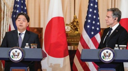 U.S. Secretary of State Antony Blinken listens as Japan's Foreign Minister Yoshimasa Hayashi speaks ...